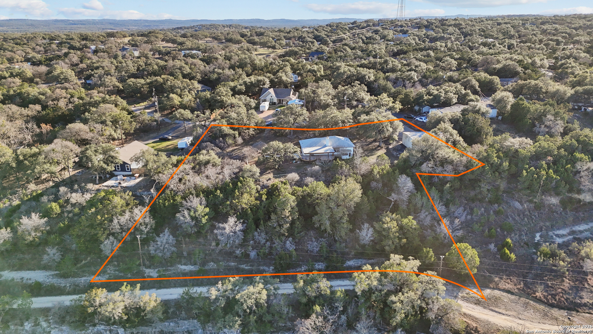 431 Windy Hill Drive Spring Branch, TX 78070 - Photo 44 of 45 an aerial view of residential house with outdoor space