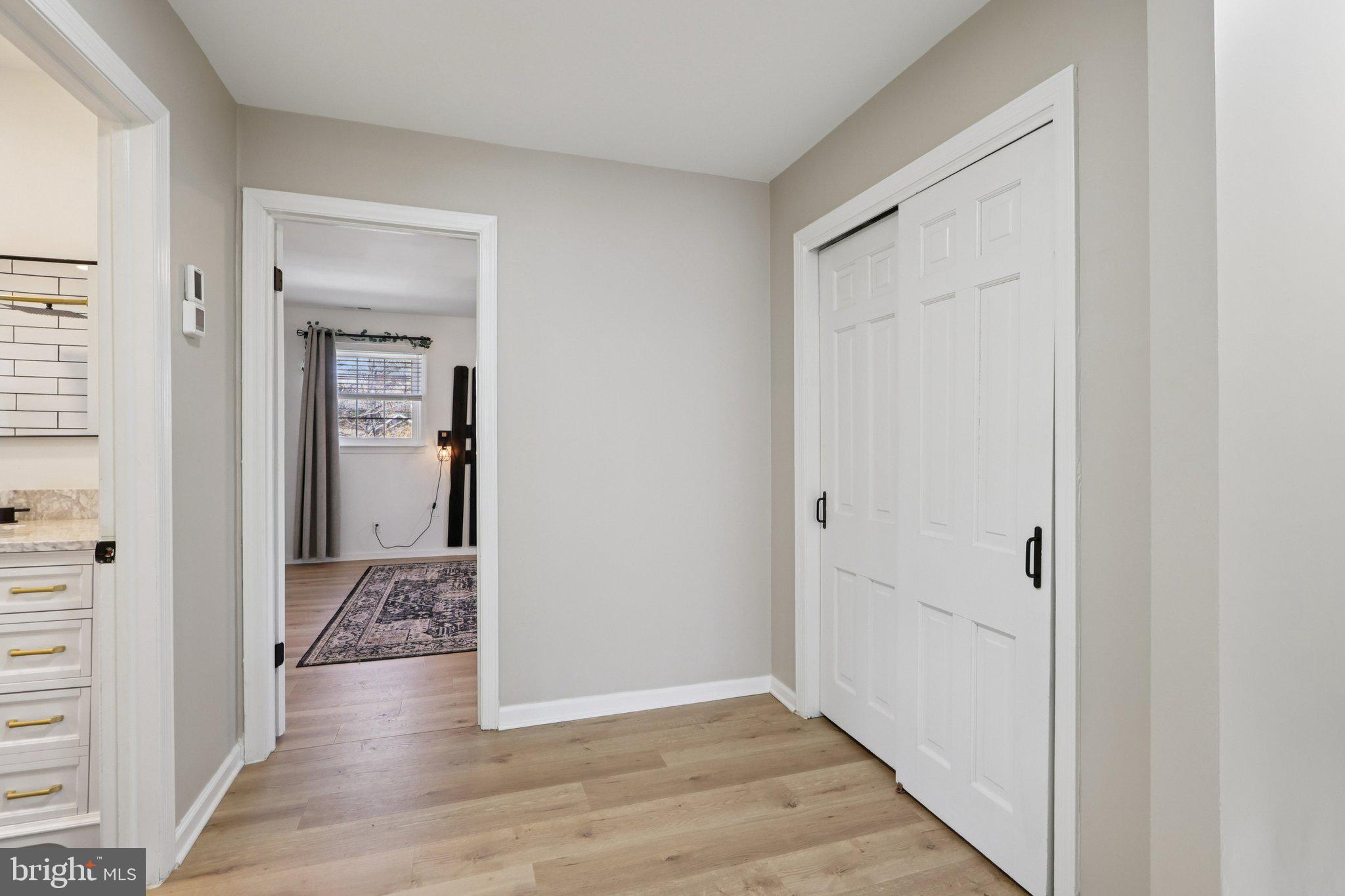 351 Merrick Road Robbinsville, NJ 08691 - Photo 33 of 69 wooden floor with white walls