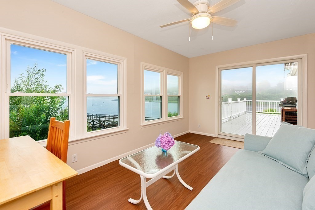 63 River Road Ipswich, MA 01938 - Photo 17 of 31 a living room with furniture and a large window