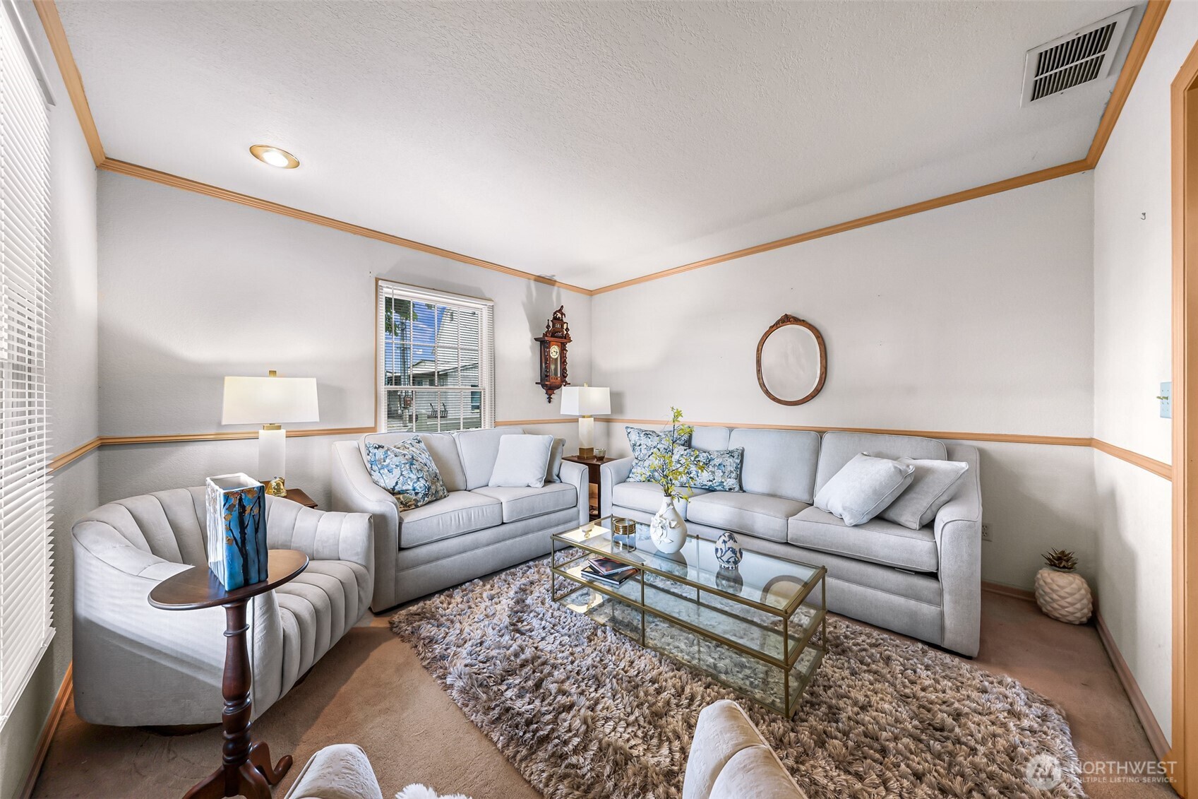 8634 Double Ditch Road Lynden, WA 98264 - Photo 8 of 40 a living room with furniture a rug and a window