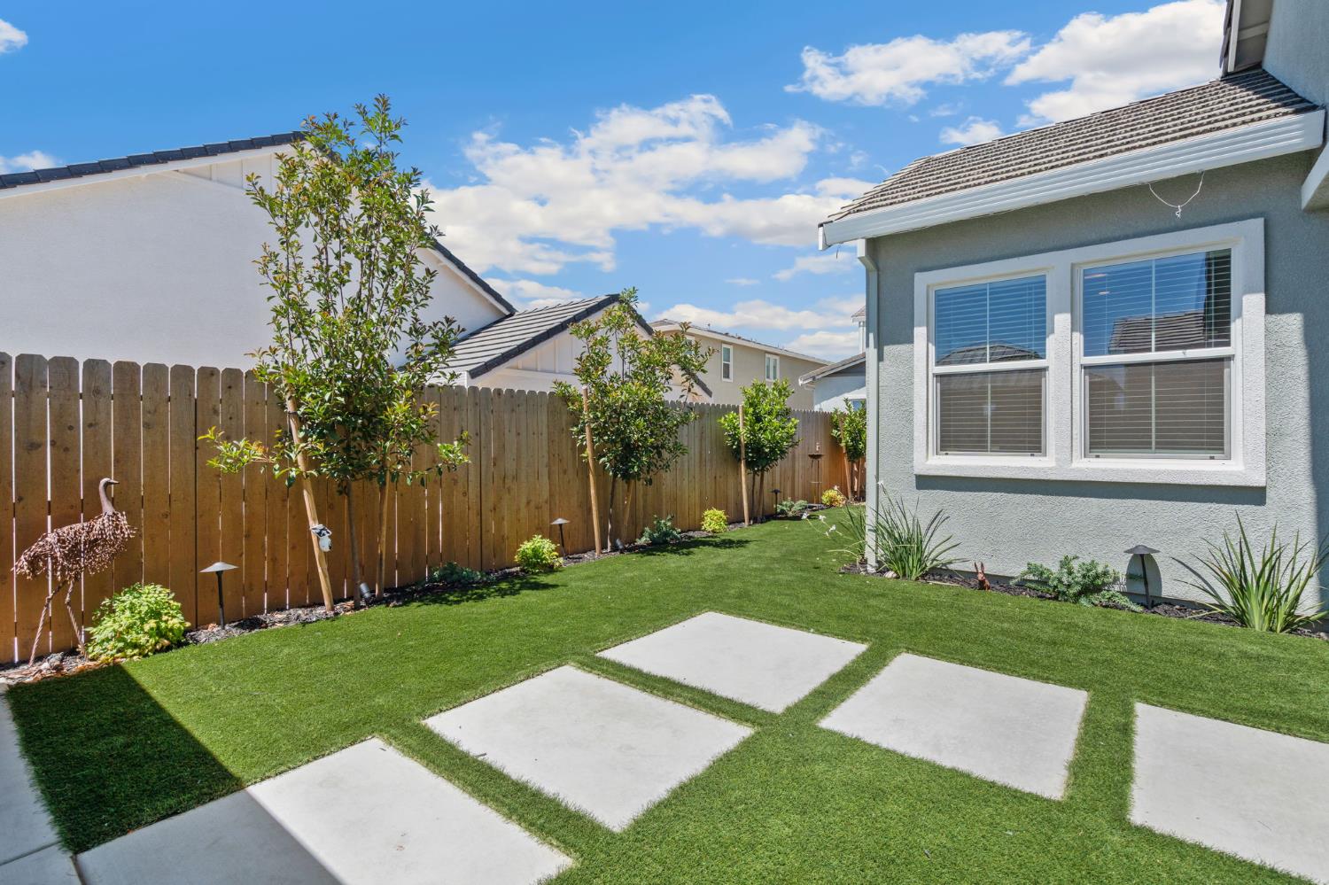 4314 Moro Cyn Street Rancho Cordova, CA 95742 - Photo 36 of 39 a view of a house with a yard