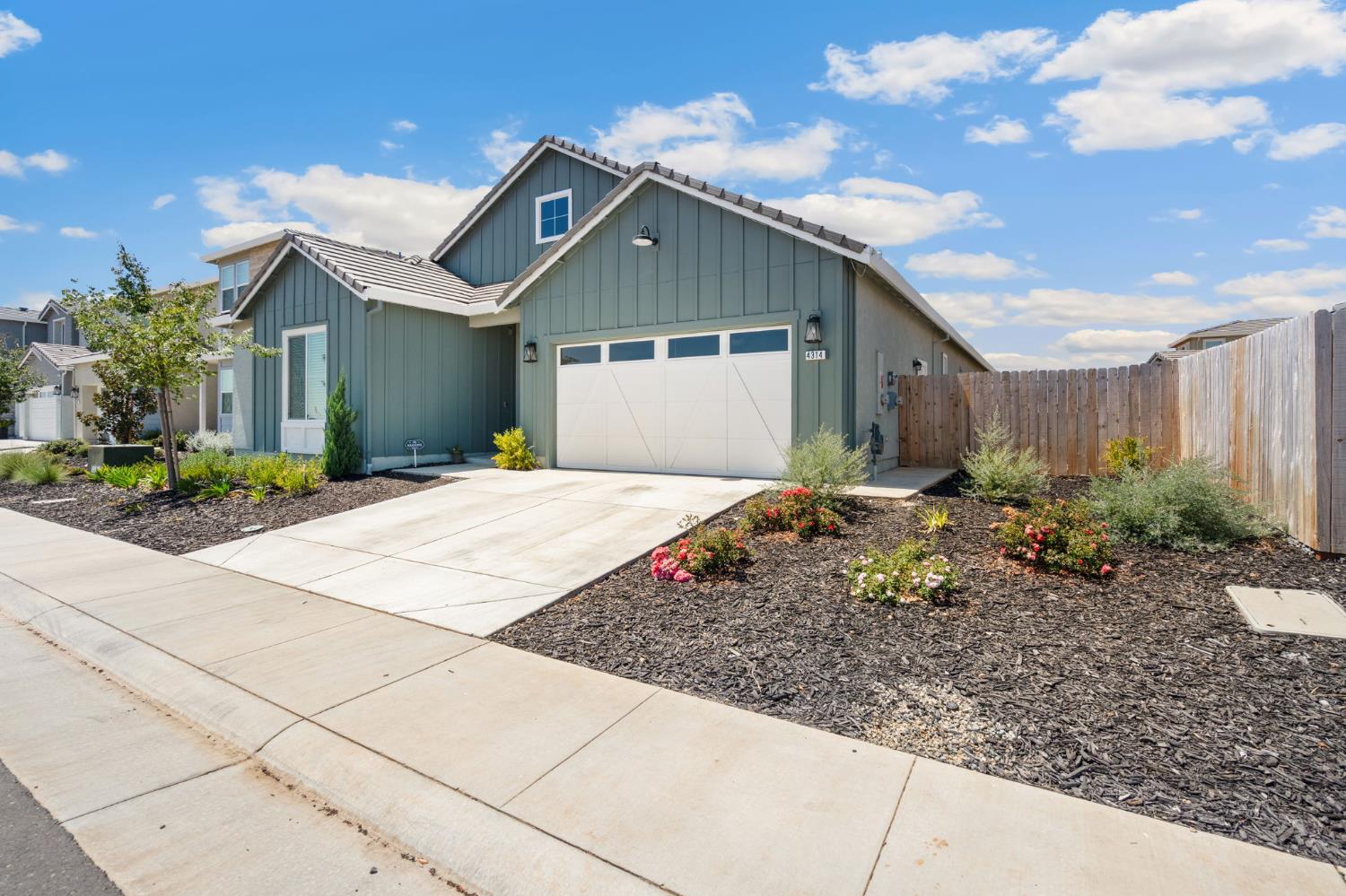 4314 Moro Cyn Street Rancho Cordova, CA 95742 - Photo 39 of 39 a front view of house with yard and trees around