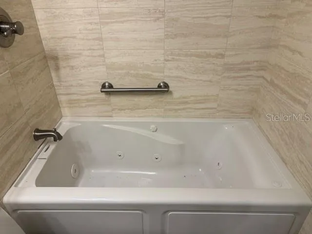 a bathroom with a bathtub