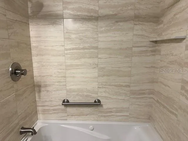 a bathroom with a bathtub
