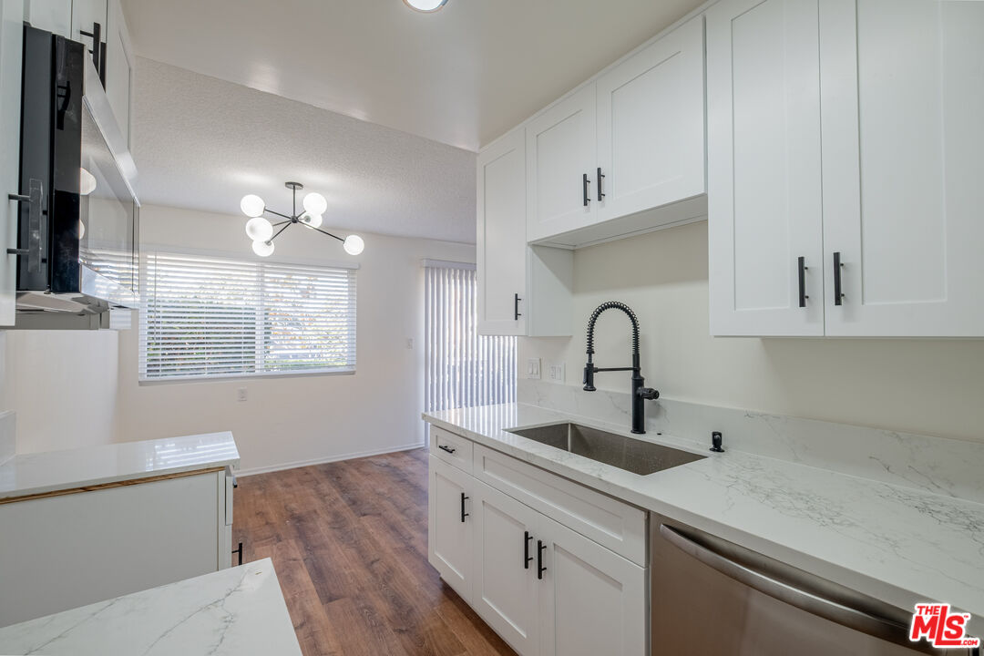 3826 Prospect Avenue, Unit 1 Culver City, CA 90232 - Photo 11 of 20 a kitchen with a sink cabinets and window