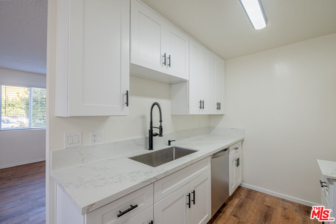 3826 Prospect Avenue, Unit 1 Culver City, CA 90232 - Photo 12 of 20 a kitchen with a sink cabinets and wooden floor