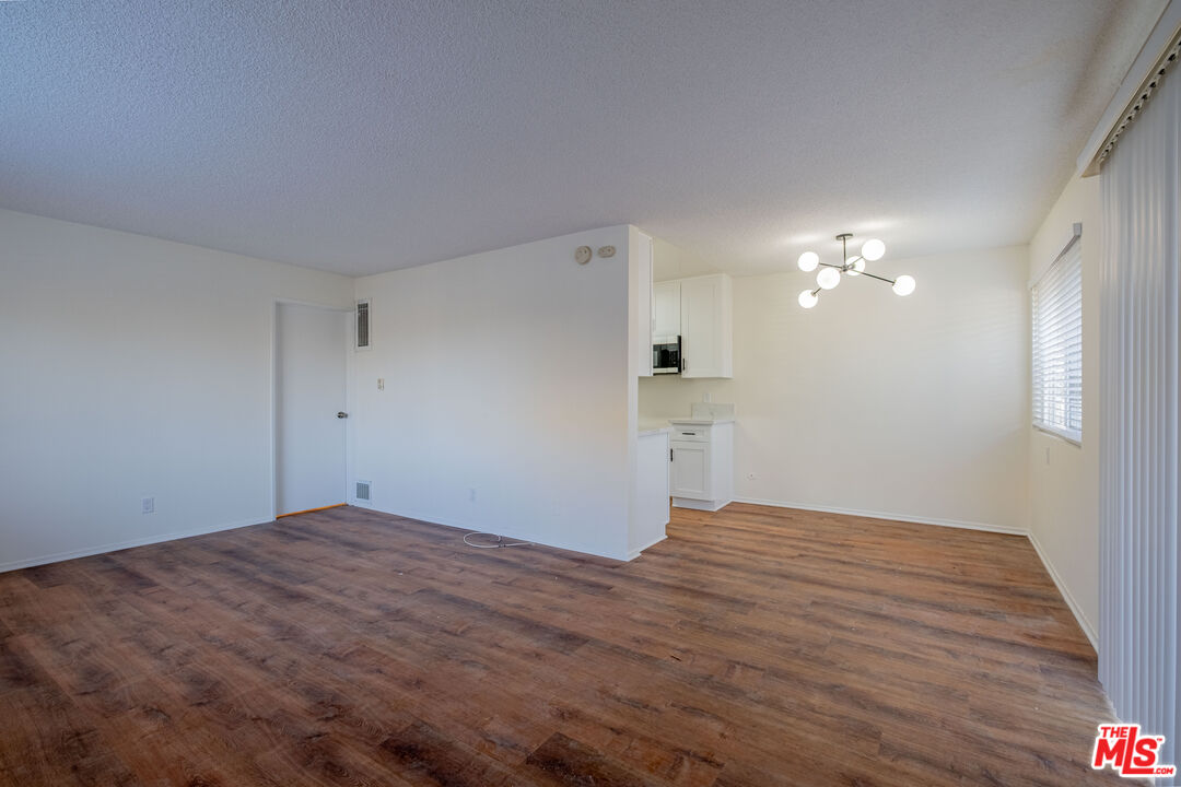 3826 Prospect Avenue, Unit 1 Culver City, CA 90232 - Photo 3 of 20 a view of empty room with wooden floor