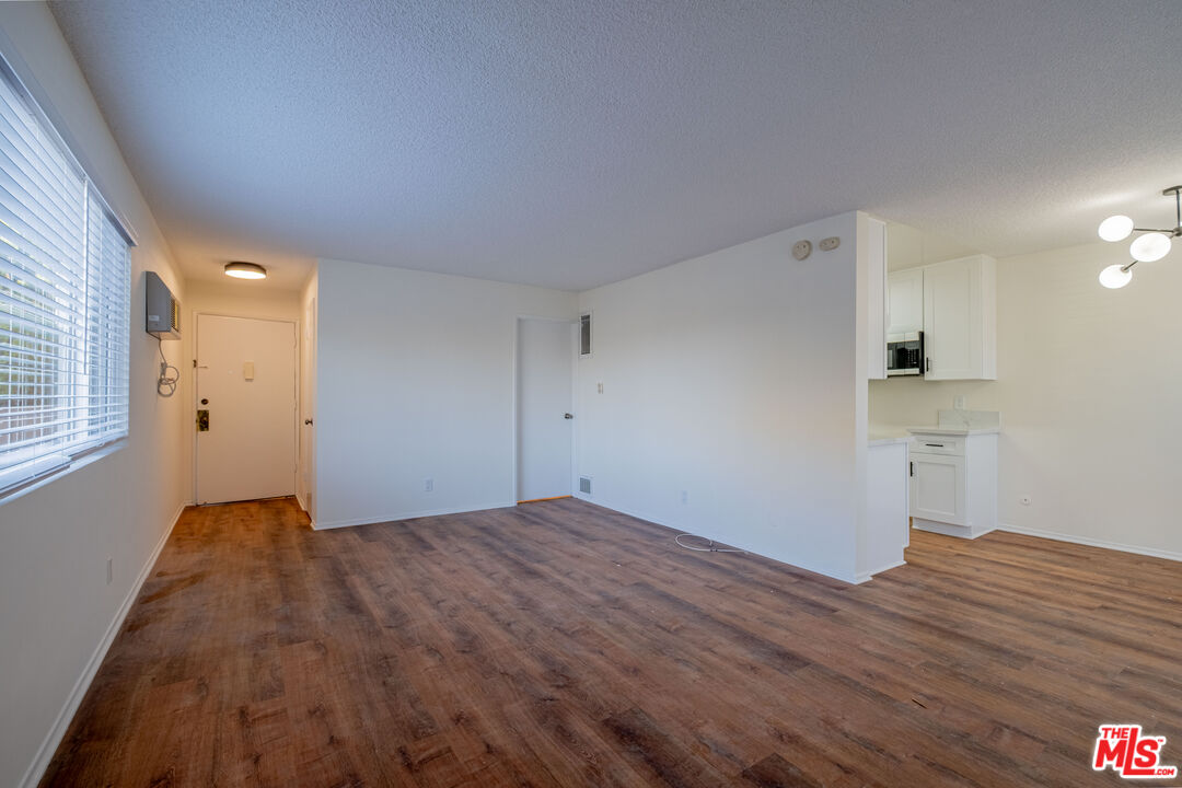 3826 Prospect Avenue, Unit 1 Culver City, CA 90232 - Photo 4 of 20 a view of empty room with wooden floor