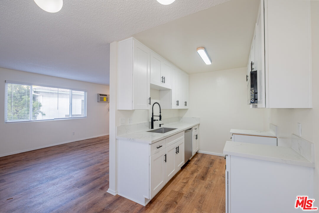 3826 Prospect Avenue, Unit 1 Culver City, CA 90232 - Photo 7 of 20 a kitchen with a sink and cabinets