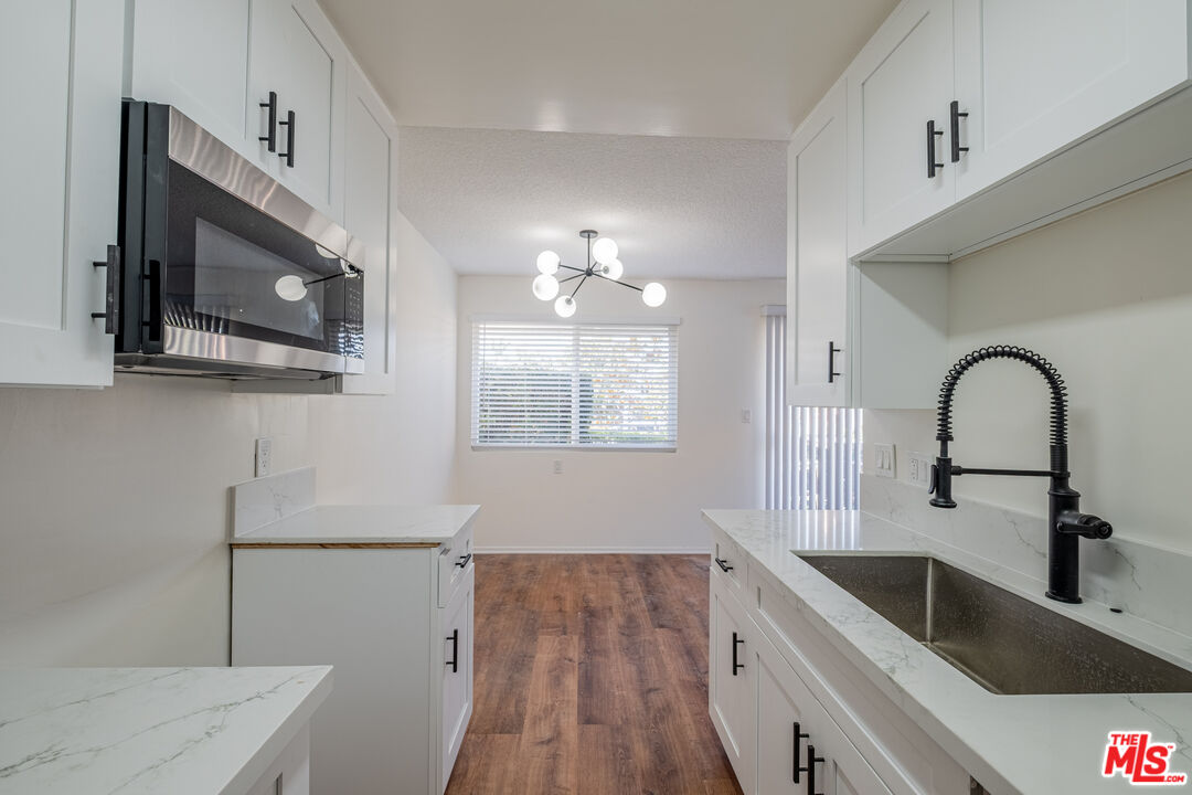 3826 Prospect Avenue, Unit 1 Culver City, CA 90232 - Photo 9 of 20 a kitchen with a sink and a microwave