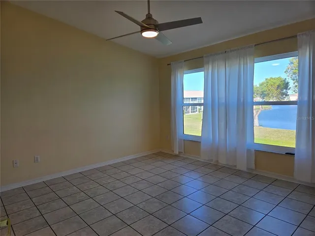 an empty room with windows