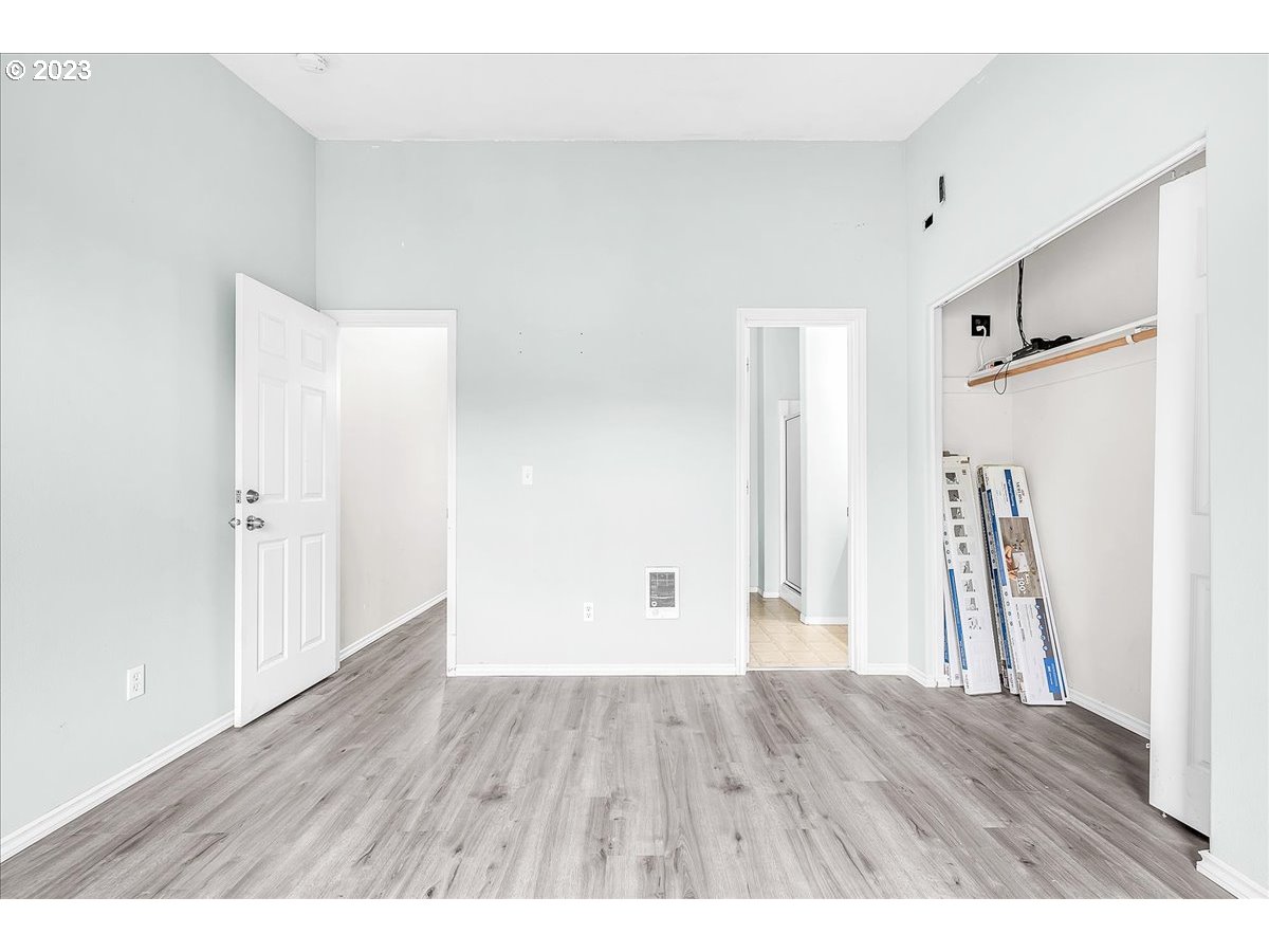 34970 Burt Road St. Helens, OR 97051 - Photo 25 of 33 a view of empty room with wooden floor