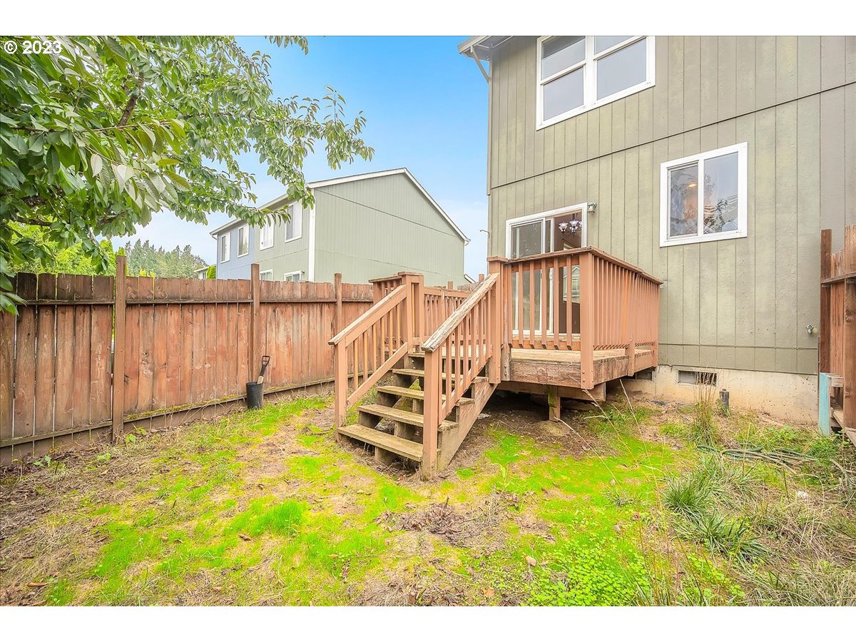 34970 Burt Road St. Helens, OR 97051 - Photo 30 of 33 a view of a house with backyard and wooden fence