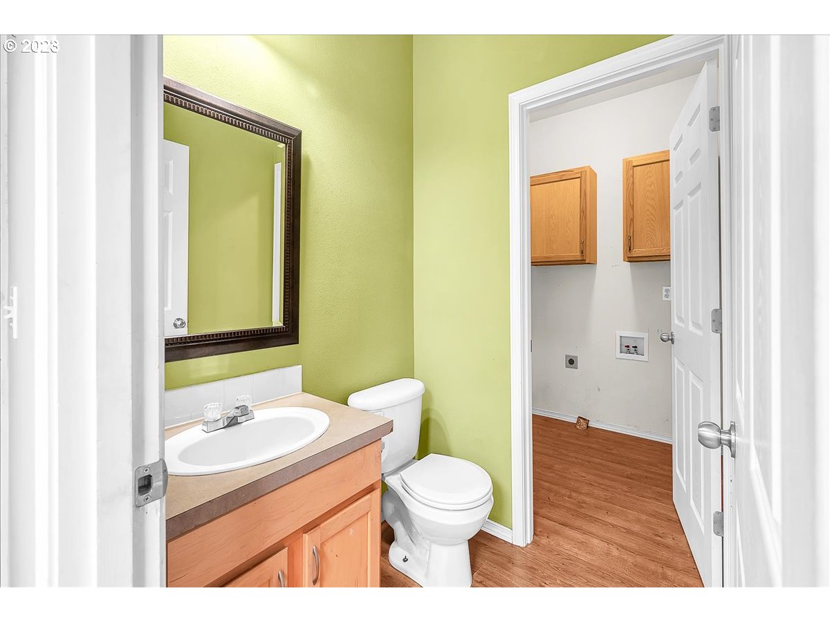 34970 Burt Road St. Helens, OR 97051 - Photo 6 of 33 a bathroom with a granite countertop sink toilet and mirror
