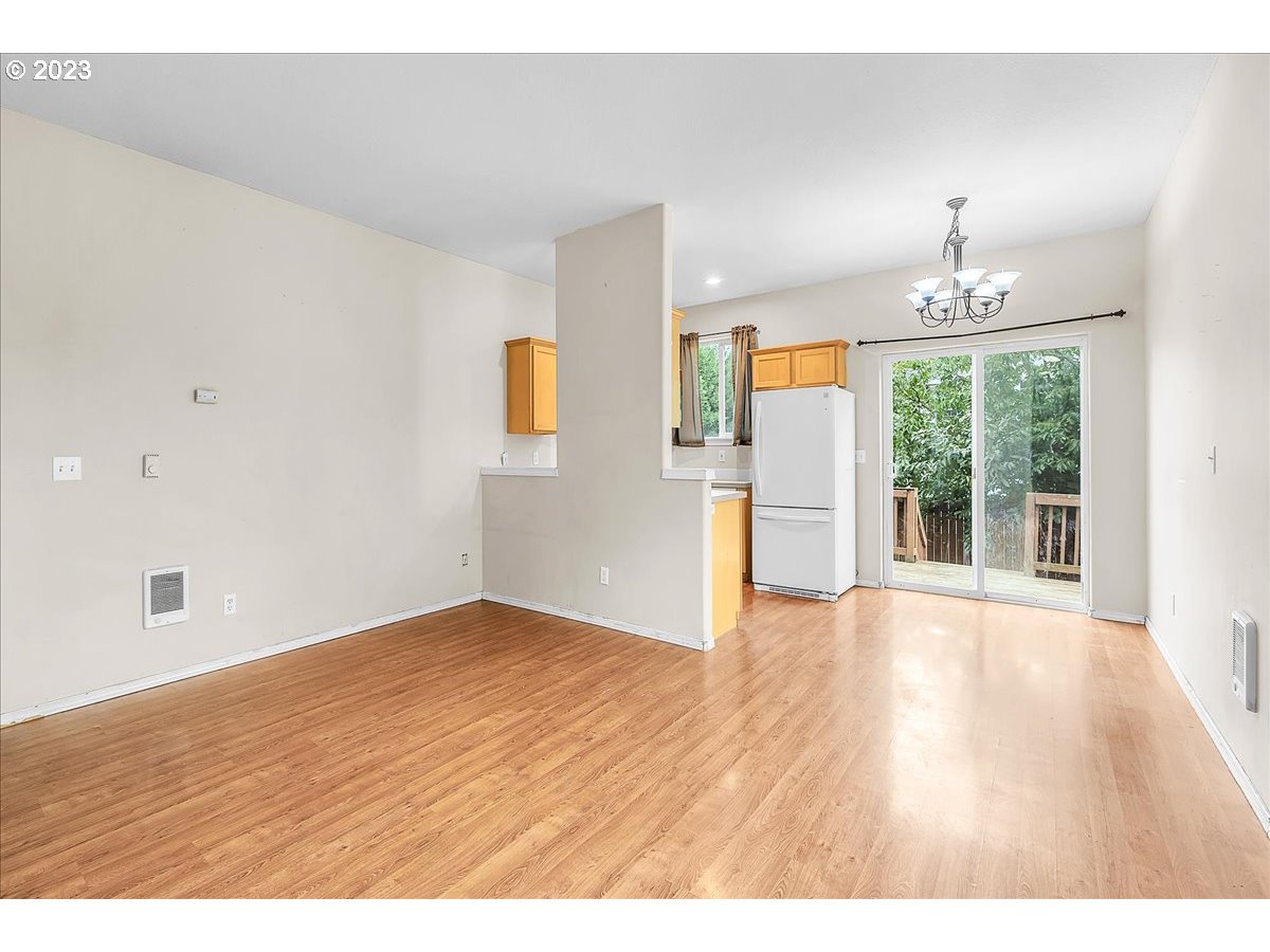34970 Burt Road St. Helens, OR 97051 - Photo 8 of 33 a view of an empty room with wooden floor and a window