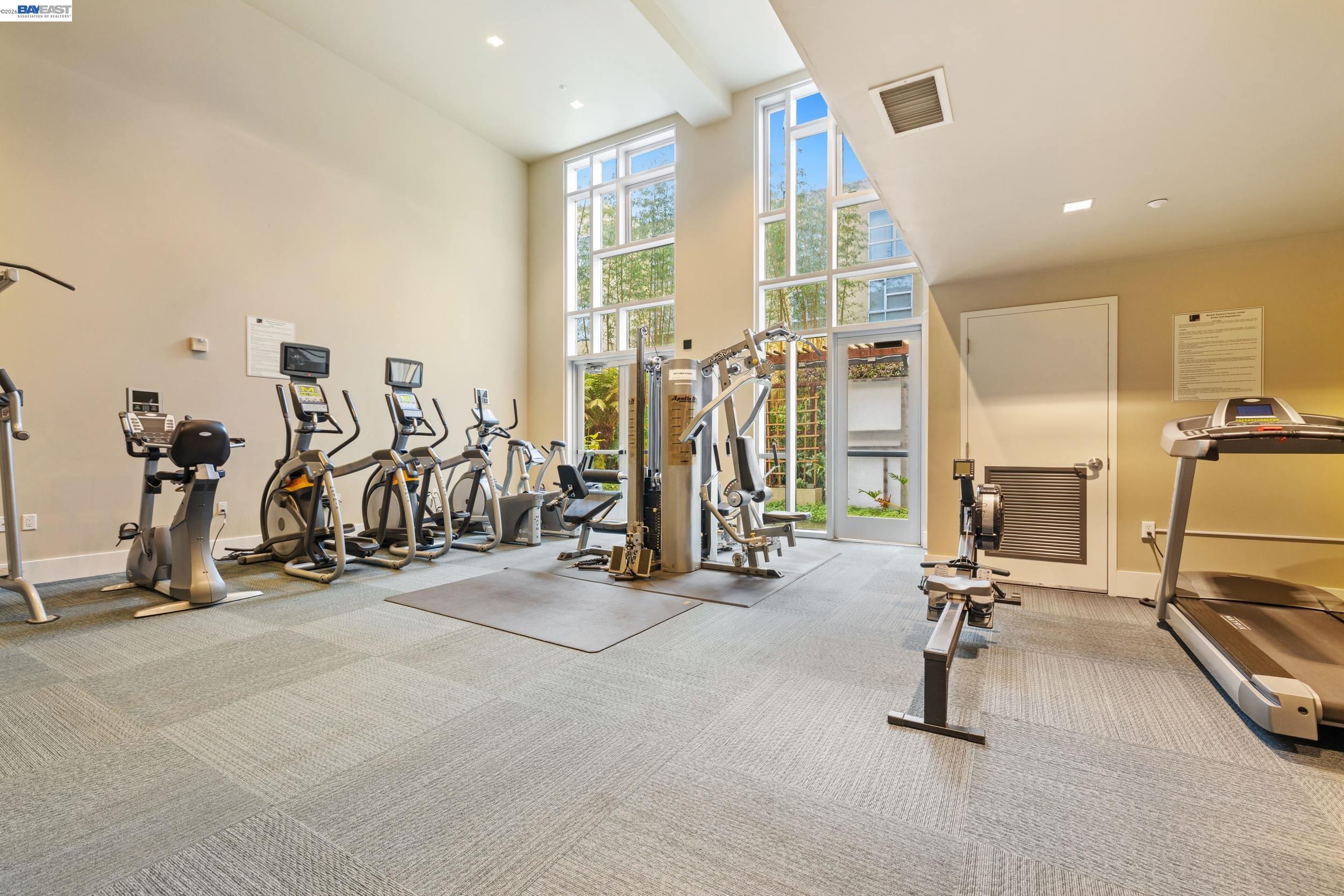 585 Ninth Street, Unit 443 Oakland, CA 94607 - Photo 24 of 32 a view of a room with gym equipment