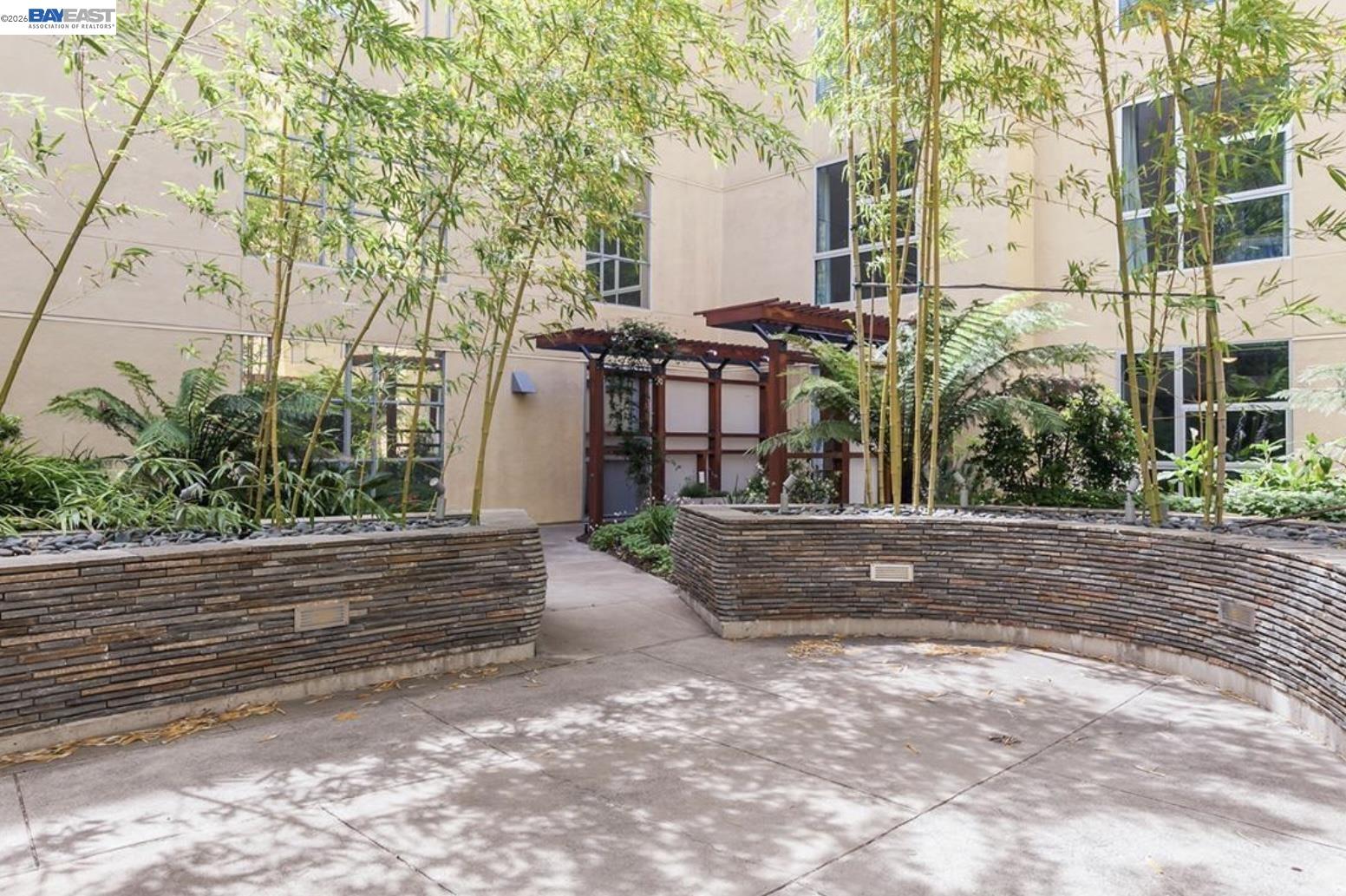 585 Ninth Street, Unit 443 Oakland, CA 94607 - Photo 30 of 32 a view of street along with house and trees