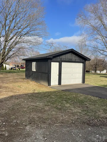 a house view with a outdoor space