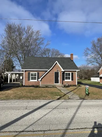 front view of a house with a street