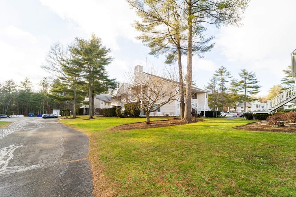 750 Whittenton Street, Unit 523 Taunton, MA 02780 - Photo 28 of 37 a view of a playground with basketball court