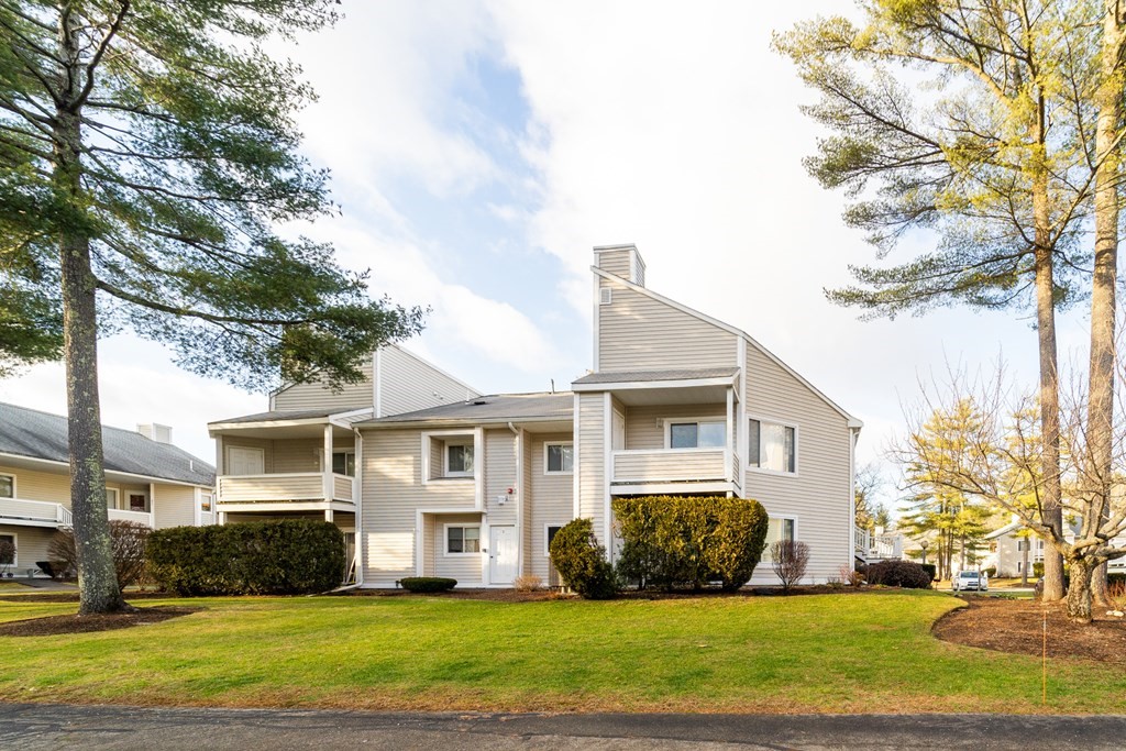 750 Whittenton Street, Unit 523 Taunton, MA 02780 - Photo 29 of 37 a front view of a house with a yard