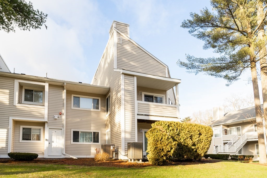 750 Whittenton Street, Unit 523 Taunton, MA 02780 - Photo 31 of 37 a view of a house with a yard