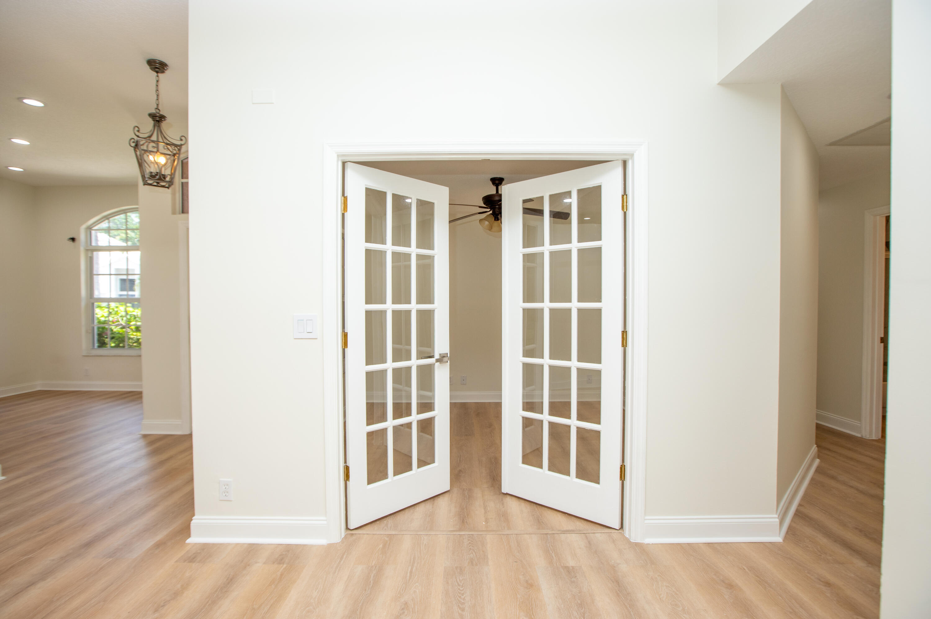 10821 La Salinas Circle Boca Raton, FL 33428 - Photo 14 of 64 a view of a room with wooden floor and a window