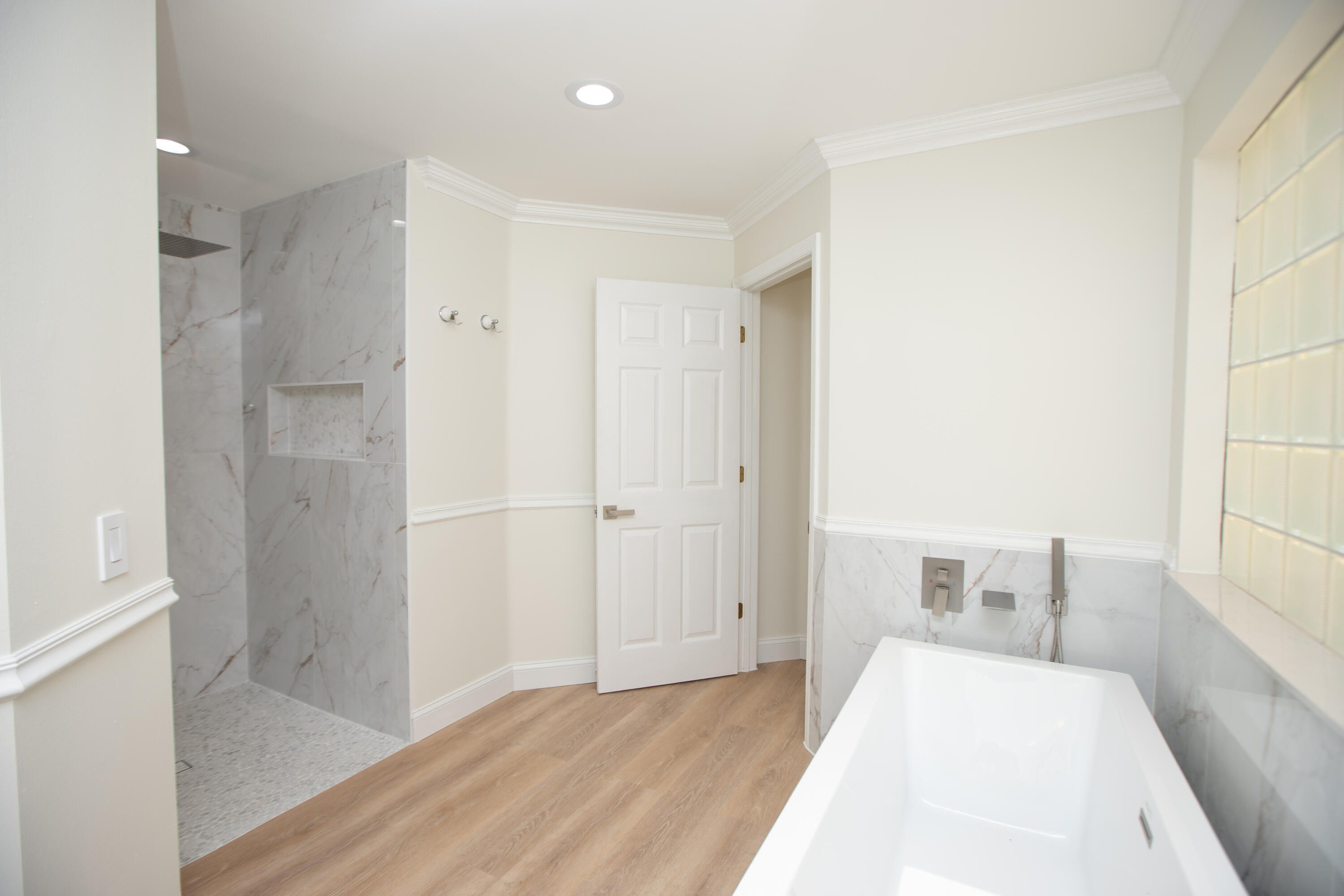 10821 La Salinas Circle Boca Raton, FL 33428 - Photo 22 of 64 a view of a bedroom with wooden floor and windows