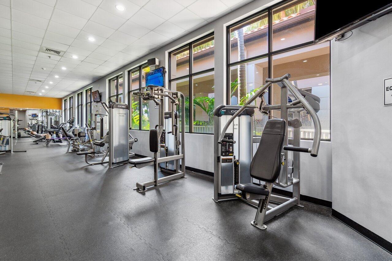 10821 La Salinas Circle Boca Raton, FL 33428 - Photo 53 of 64 a view of a room with gym equipment