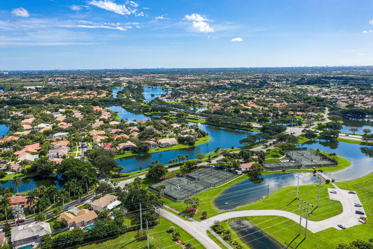 10821 La Salinas Circle Boca Raton, FL 33428 - Photo 60 of 64 an aerial view of a house with a ocean view