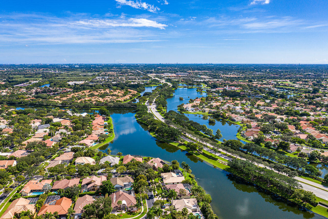 10821 La Salinas Circle Boca Raton, FL 33428 - Photo 61 of 64 an aerial view of residential houses with outdoor space