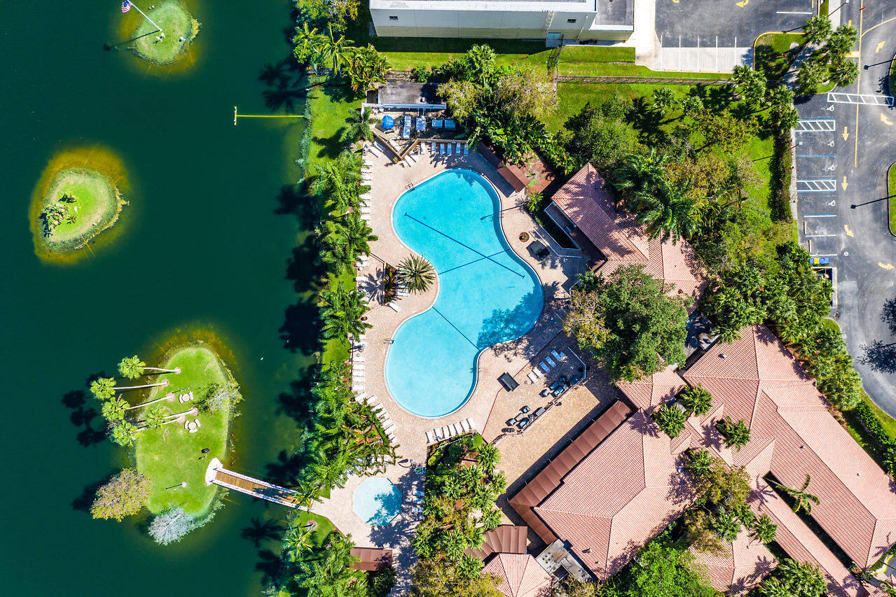 10821 La Salinas Circle Boca Raton, FL 33428 - Photo 62 of 64 an aerial view of a house with garden space sitting space and swimming pool