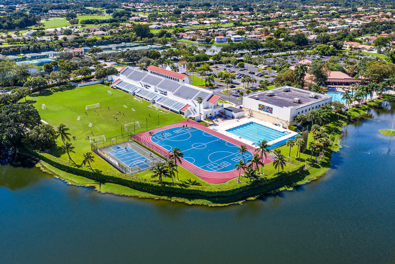 10821 La Salinas Circle Boca Raton, FL 33428 - Photo 64 of 64 an aerial view of a pool yard swimming pool and outdoor seating
