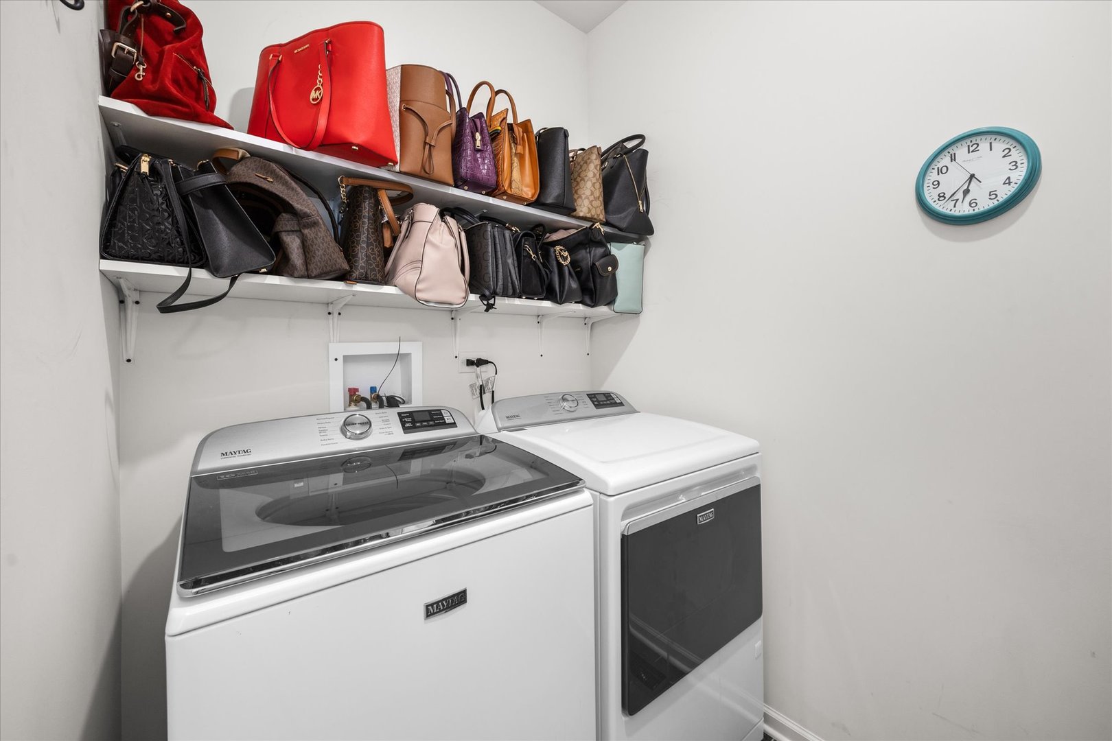10122 Jonamac Avenue Huntley, IL 60142 - Photo 11 of 27 a view of washer and dryer