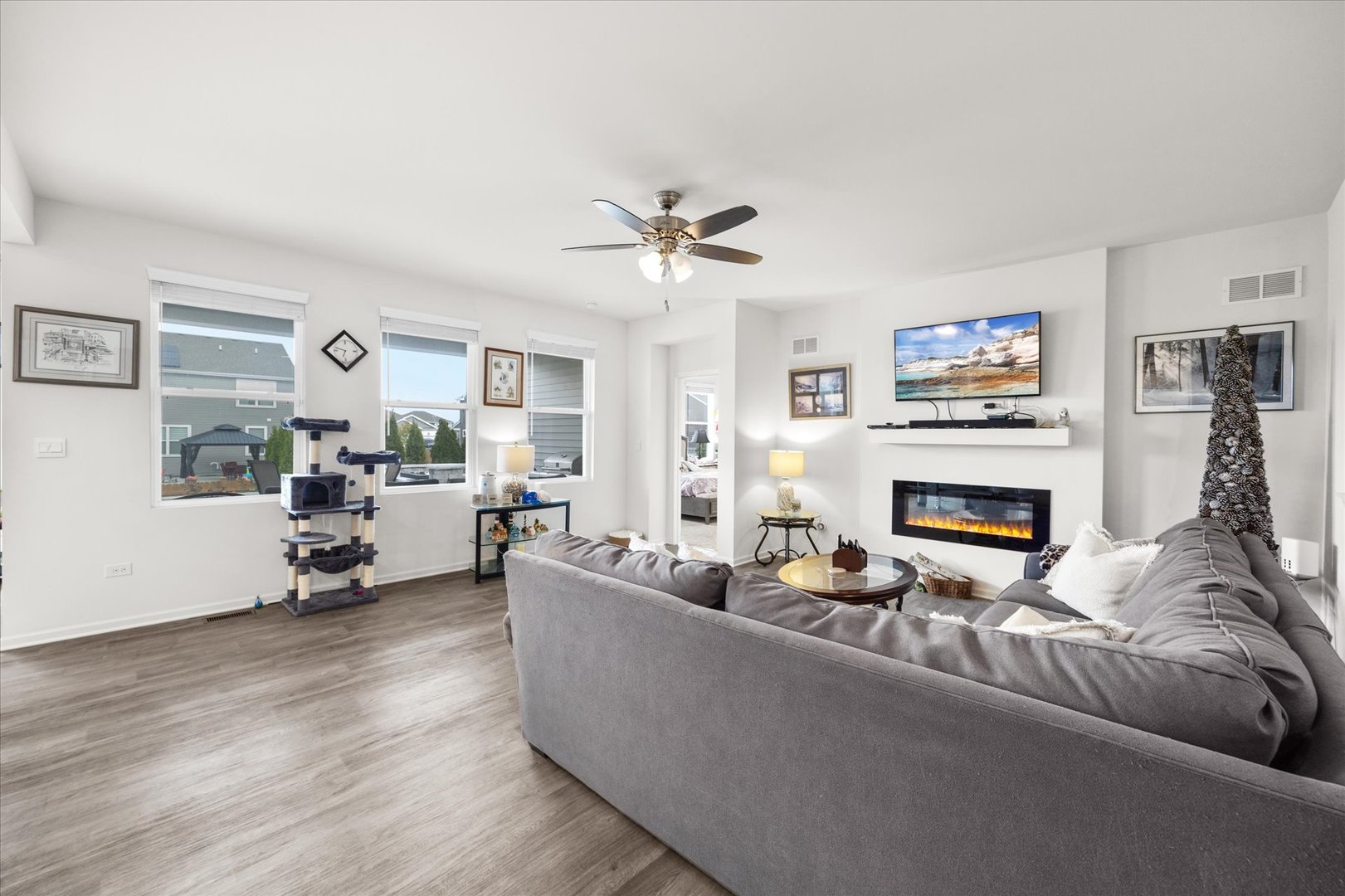 10122 Jonamac Avenue Huntley, IL 60142 - Photo 13 of 27 a living room with furniture and a fireplace