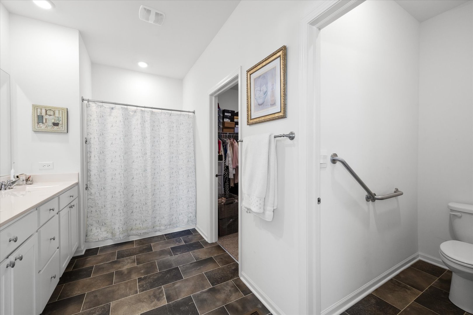 10122 Jonamac Avenue Huntley, IL 60142 - Photo 20 of 27 a bathroom with a granite countertop sink toilet and shower