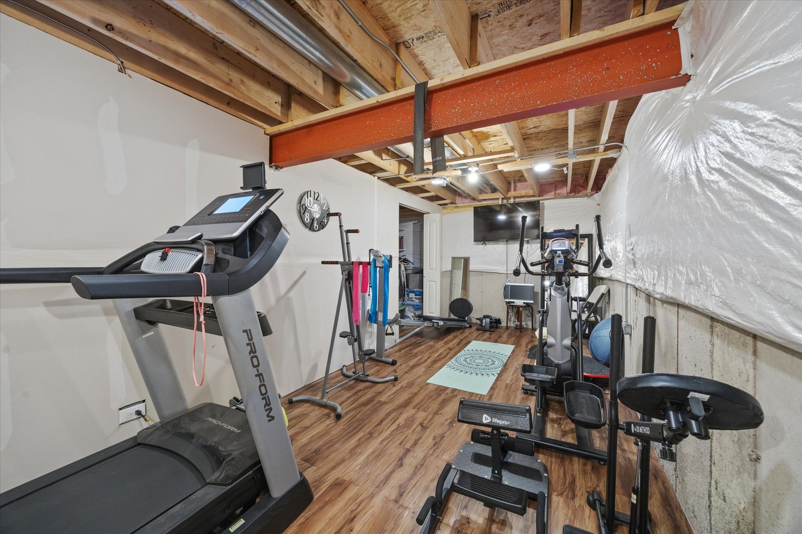 10122 Jonamac Avenue Huntley, IL 60142 - Photo 22 of 27 a view of a room with gym equipment