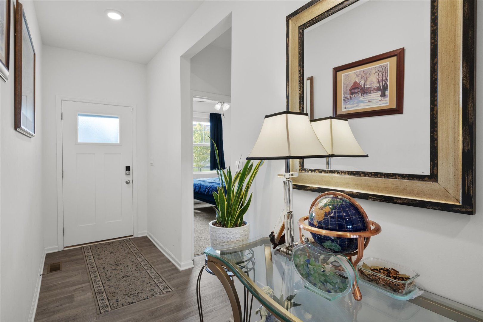 10122 Jonamac Avenue Huntley, IL 60142 - Photo 6 of 27 a living room with furniture and wooden floor