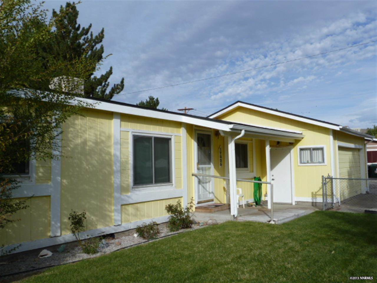 17535 Macaw Lane Reno, NV 89508 - Photo 1 of 1 front view of a house with a yard