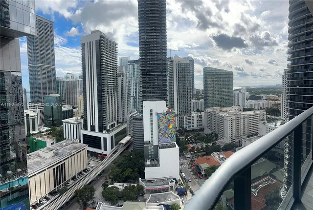 a view of balcony with furniture