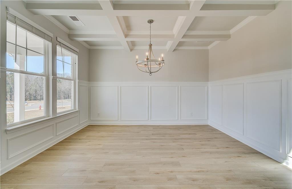 228 Ruthe Cove Locust Grove, GA 30248 - Photo 5 of 31 a view of empty room with window