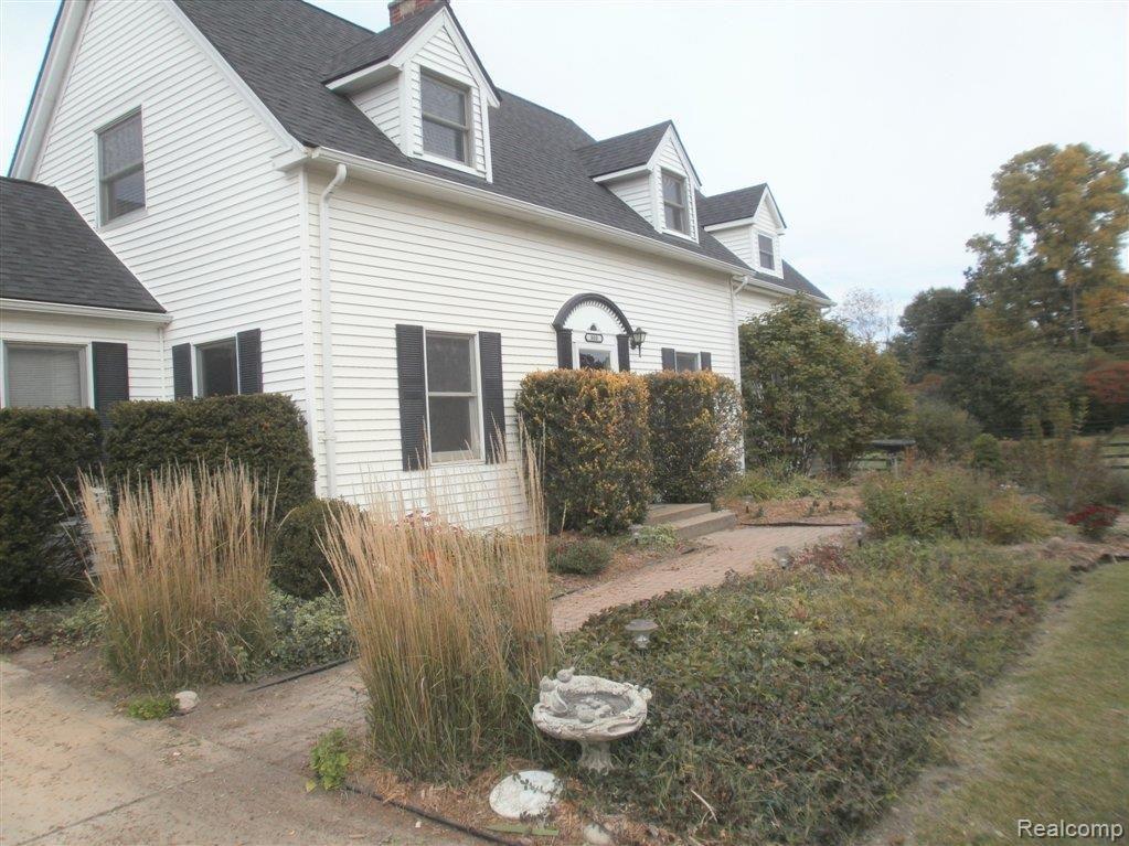 800 Lone Tree Road Highland, MI 48357 - Photo 17 of 18 Brick paved walkway