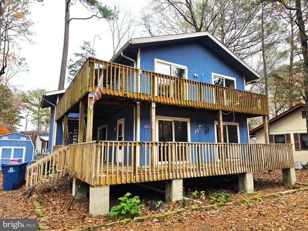 a front view of a house with a porch