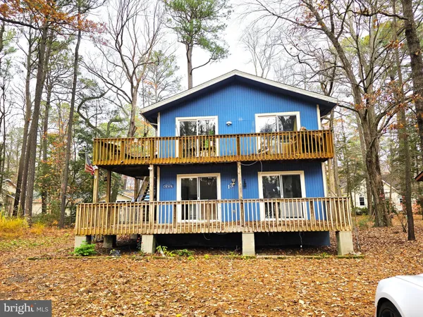 a view of a house with a deck