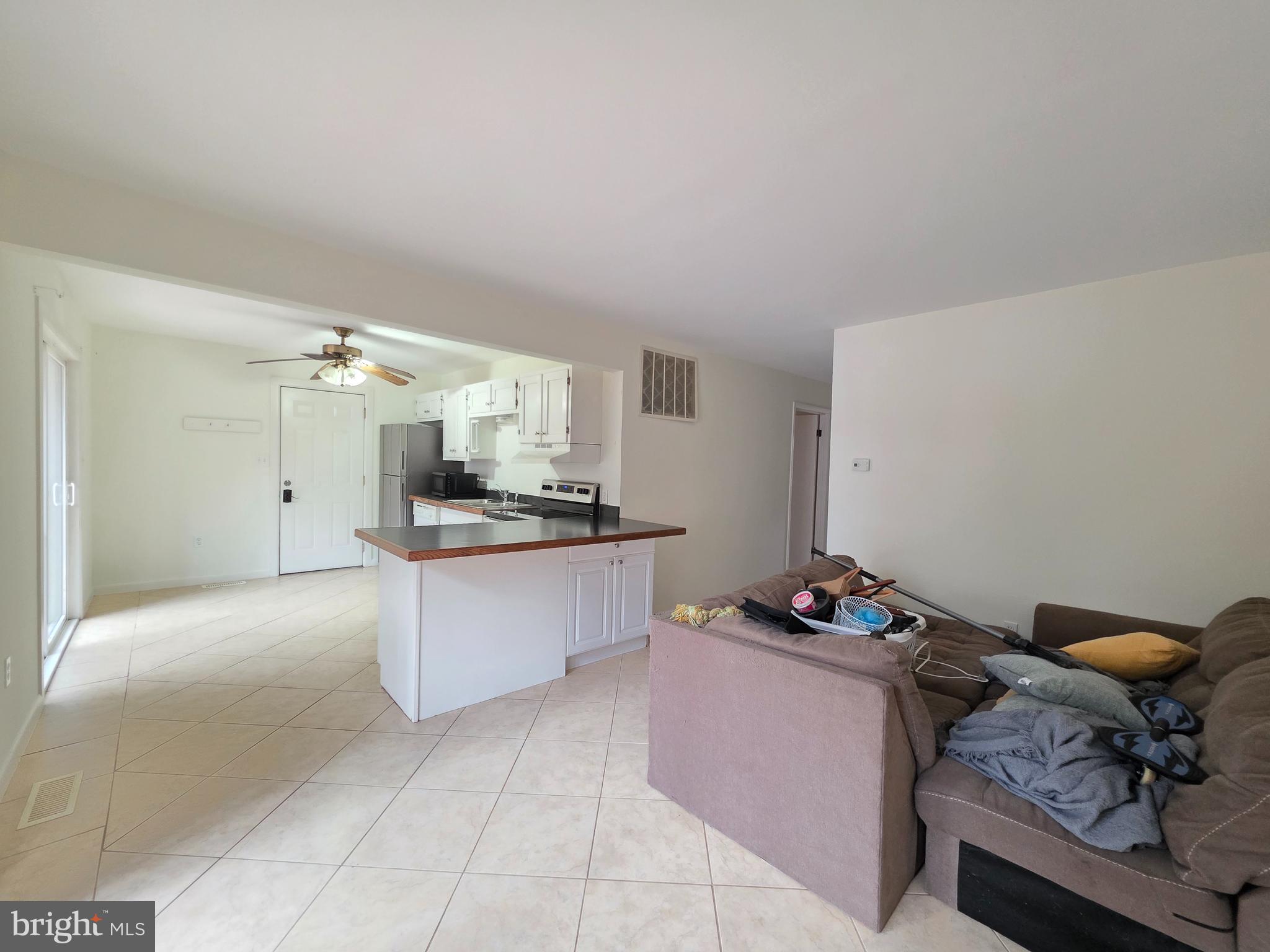 13 Sailors Way Ocean Pines, MD 21811 - Photo 10 of 33 a kitchen with granite countertop a sink and a stove