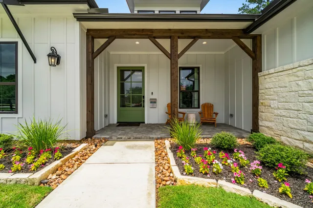 a front view of a house with a porch