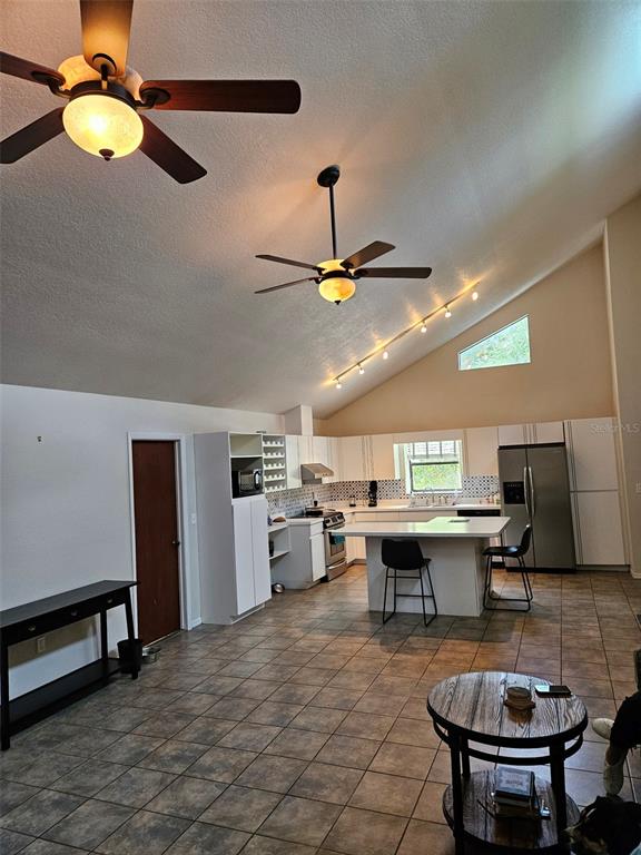 2596 96th Street Arcadia, FL 34266 - Photo 9 of 59 a dining room with a table and chairs