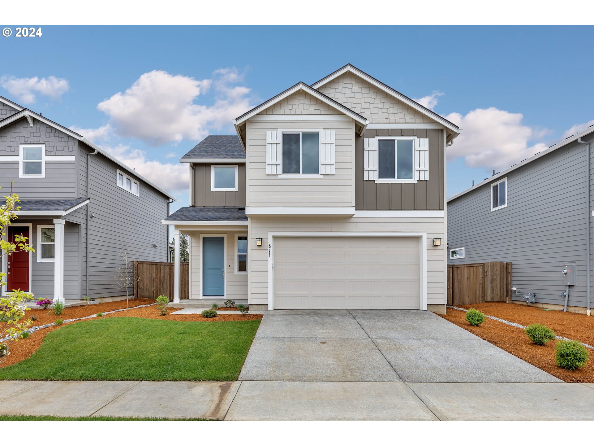 8711 North 3rd Street, Unit 40 Ridgefield, WA 98642 - Photo 1 of 16 a view of a yard in front view of a house