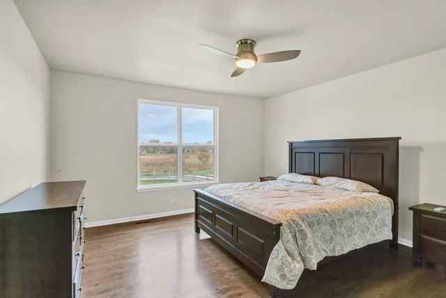 a kitchen with a refrigerator a stove a microwave and cabinets