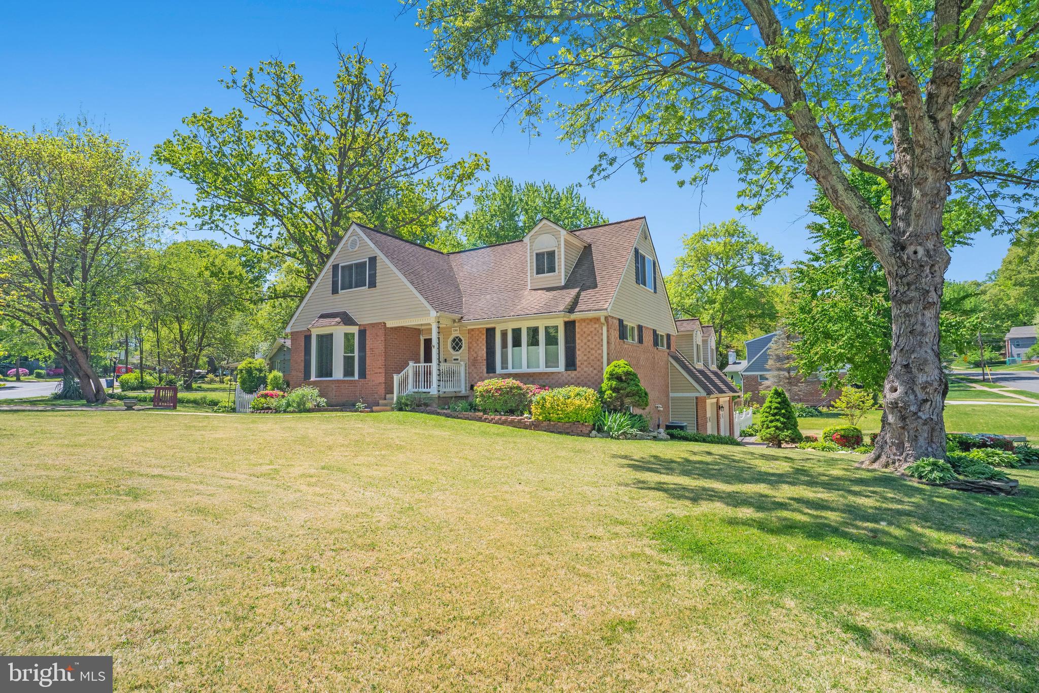 5300 Kings Park Drive Springfield, VA 22151 - Photo 1 of 62 a front view of a house with a garden